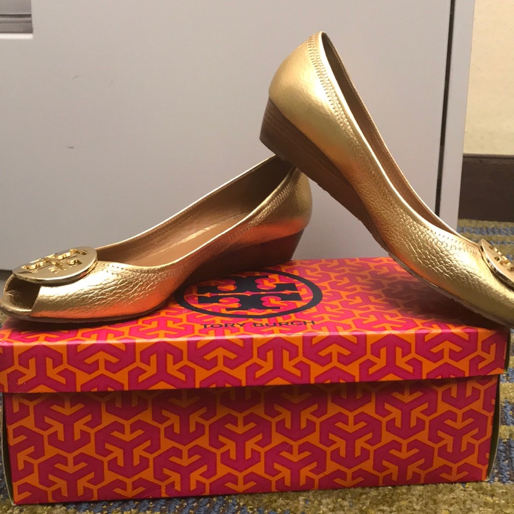 Tory Burch gold wedge shoes